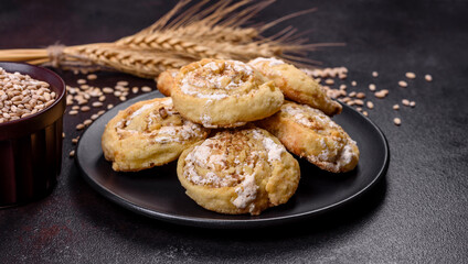 Homemade glazed puff pastry cinnamon rolls with custard and raisins
