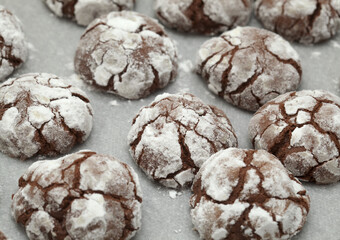 Home made chocolate cookies with crackled icing sugar  coating 