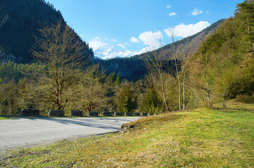 Winding road to Lake Ritsa, view of the snow-capped mountains of the Caucasus. Abkhazia