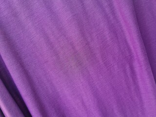 Abstract background purple cloth involved forming silhouette