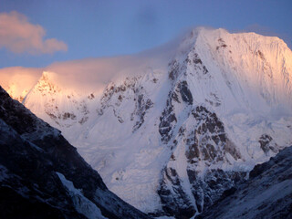 A magnificient view of Mt. Kangchengyao Peak 6889 mtr during sunrise as seen from the base camp in North Sikkim.