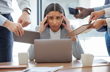 This is too much for me. Shot of a young businesswoman feeling stressed out in a demanding office environment at work. - obrazy, fototapety, plakaty