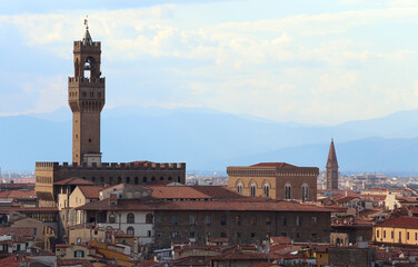 Fototapeta na wymiar Old Palace in Florence City in Italy and the Tower called TORRE Arnolfo di Cambio