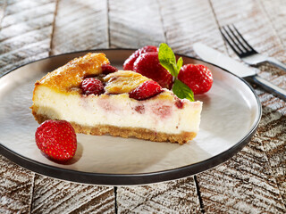 Slice of cheesecake with strawberries