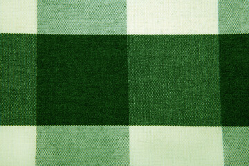 closeup of the  checkered green and black tabric texture