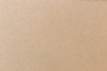 Brown paper background on the cover of the notebook.