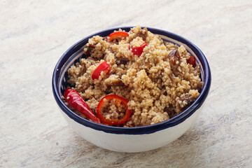 Arabic cous cous with meat and tomato