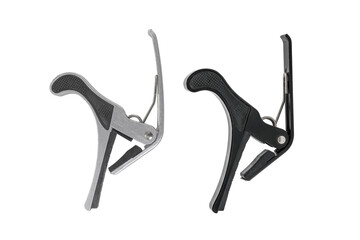 aluminum capo for acoustic and classical guitar isolated with clipping path include for design usage purpose.
