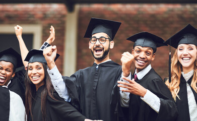 Celebrate every victory in your life. Shot of a group of fellow students standing together on...