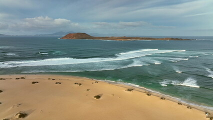 Top view of the road through the sandy national park of the Corralejo town.