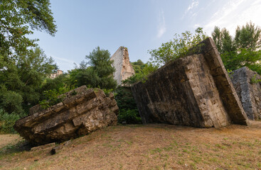 The Roman bridge of Augustus, Narni on the Nera river in Umbria. Used to cross the particular gorge of the marble and stone ruins, in the archaeological park on a summer day.