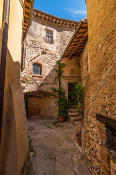 Detail of the ancient stone village of Stifone, in the canyons of the Nera river, a stone's throw from Narni in Umbria. Summer day with blue sky. Umbria Italy.
