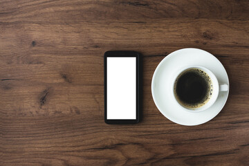 Fototapeta na wymiar office desk with coffee and smartphone on the wood background.mock up 