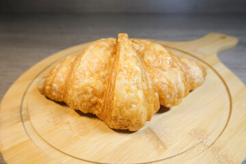 croissant on wooden background