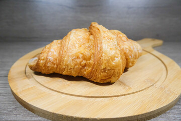 croissant on a wooden table