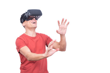 Cheerful man exploring virtual reality in goggles