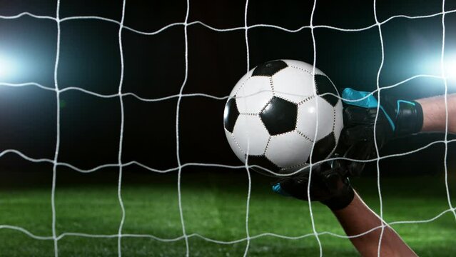 Super slow motion of goalkeeper soccer player missing the ball. Filmed on high speed cinema camera, 1000fps.
