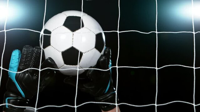 Super slow motion of goalkeeper soccer player missing the ball. Filmed on high speed cinema camera, 1000fps.