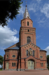 Fototapeta premium General view and architectural details of a close-up of the Catholic church of St. Michael the Archangel built at the turn of the 19th and 20th centuries in Jabłonka Koscielna in Podlasie, Poland.