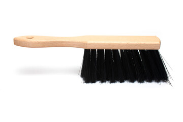closeup hand broom wooden handle white background