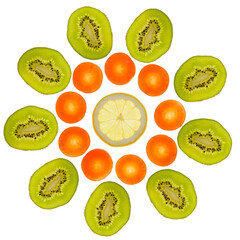 Close up of slices of green kiwi, orange carrots, yellow lemon, transparent as a background