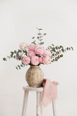 Spring bouquet of peonies and ranunculus