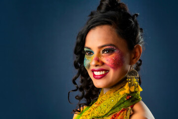 Fototapeta premium A gorgeous Young model beautiful woman or girl with perfect art creative makeup like a butterfly.