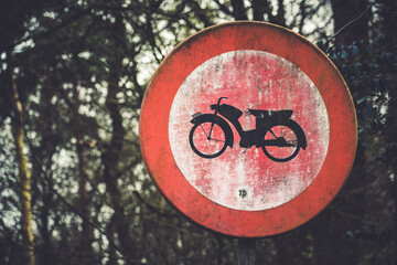 No scooter driving sign in the forest © Joanna