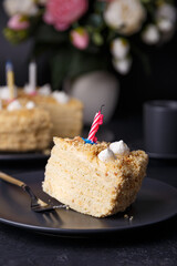 Holiday cake with crumbly shortcrust pastry and mini meringue. Birthday cake with extinguished...