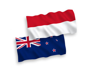 Fototapeta na wymiar Flags of Indonesia and New Zealand on a white background