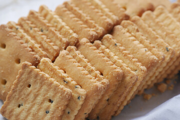 close up of sweet cookies on wooden table 