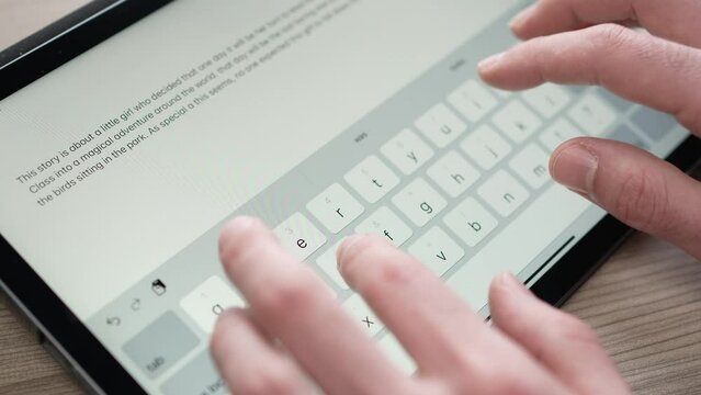 Timelapse Fingers Typing Text on a  Touch Screen Keyboard Tablet