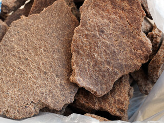Groundnut or peanut (Arachis hypogaea) cake, by-product after extraction of oil. Cattle feed and an...