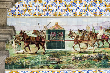 frieze with polychromatic azulejos depicting a chronology of some forms of transport used in Portugal in the Sao Bento railway station, Oporto, Portugal
