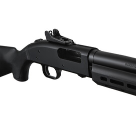 Pump-action 12 gauge shotgun isolated on a white back. Close-up shot of part of a shotgun. A...