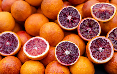 Whole and cut orange oranges high angle view.