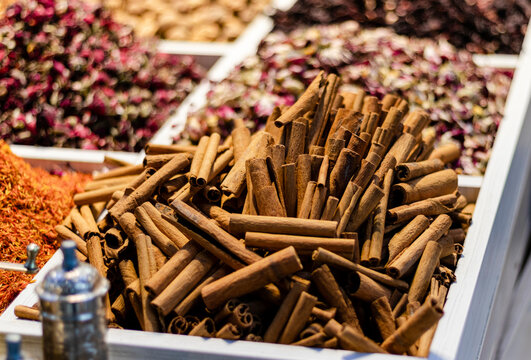 Pile cinnamon sticks close up.