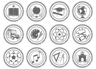 A set of 12 unique grunge stamps, education themed. Each stamp is isolated, grouped, labeled, and on an individual layer.
