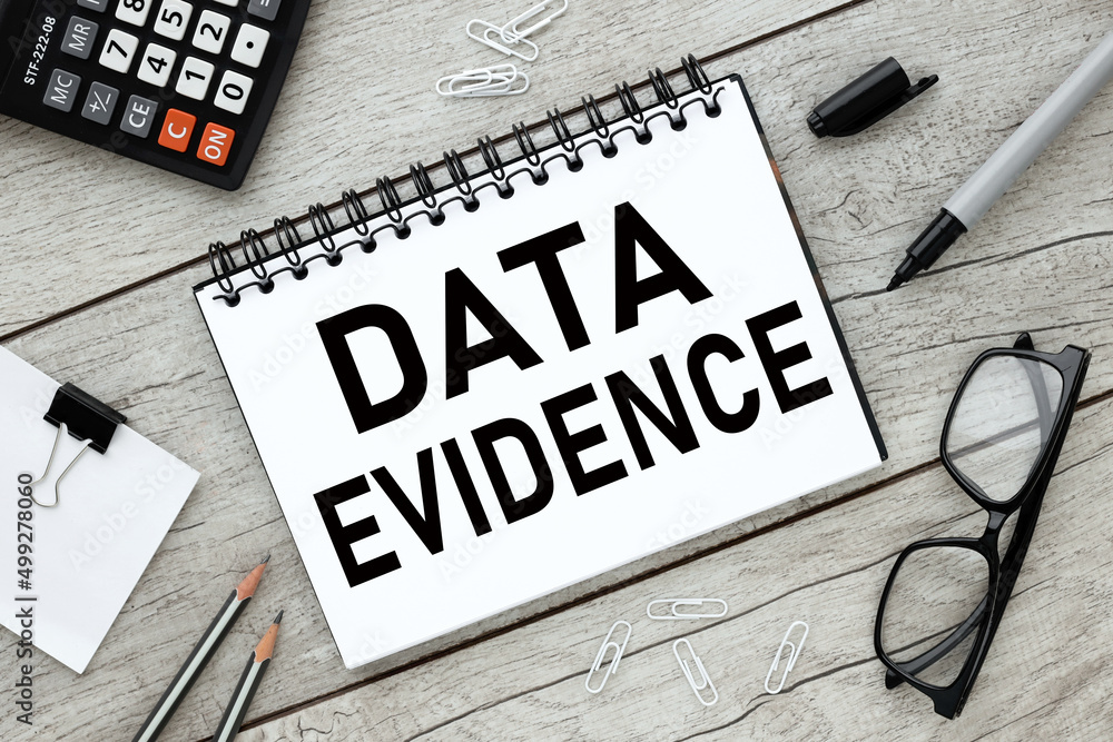 Poster DATA EVIDENCE - text on an open notepad on a light table