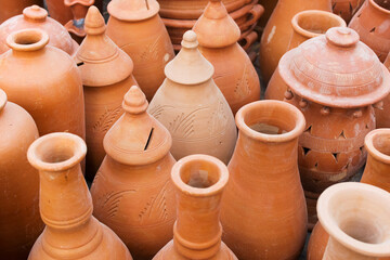 Fototapeta na wymiar KOLKATA, WEST BENGAL , INDIA - NOVEMBER 23RD 2014 : terracotta pots, artworks of handicraft, on display during Handicraft Fair in Kolkata - the biggest handicrafts fair in Asia.