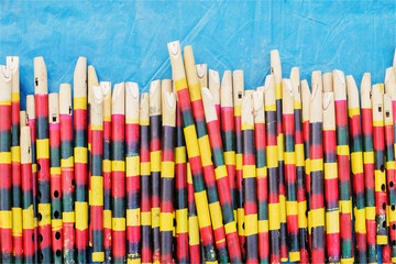 KOLKATA, WEST BENGAL , INDIA - NOVEMBER 23RD 2014 : Flutes made of slender bamboo, artworks of...