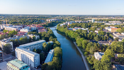 Summer aerial view of sunset over aurajoki in Turku, Finland.