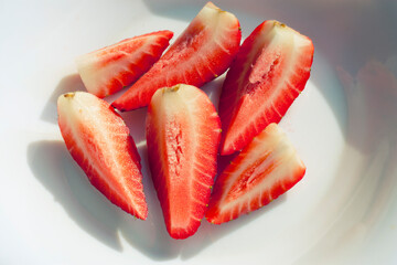 strawberry on a white plate