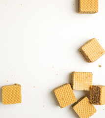 Cube wafer with chocolate cream on isolated white background