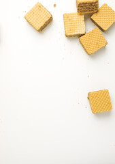 Cube wafer with chocolate cream on isolated white background