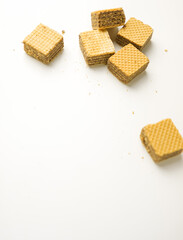 Cube wafer with chocolate cream on isolated white background