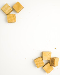 Cube wafer with chocolate cream on isolated white background