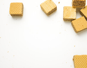 Cube wafer with chocolate cream on isolated white background