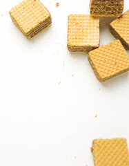 Cube wafer with chocolate cream on isolated white background