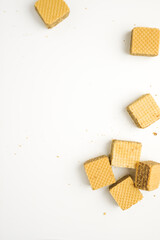 Cube wafer with chocolate cream on isolated white background